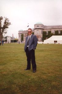 Colin Relaxing before driving up the hill in a factory Aston Martin at first Festival of Speed. This was repeated for the next two years.
